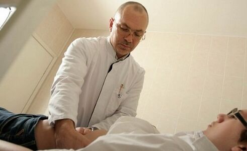 doctor examining patient with prostatitis